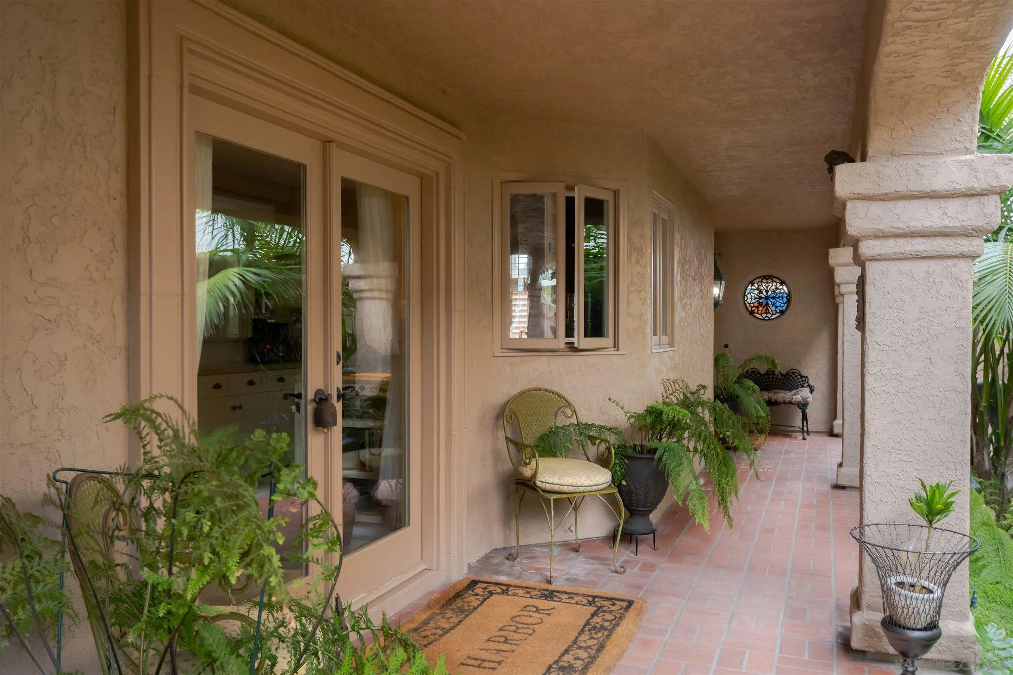 12 Buccaneer Way Coronado, CA 92118 - Photo 10 of 34 a view of a entryway door of the house with outdoor seating