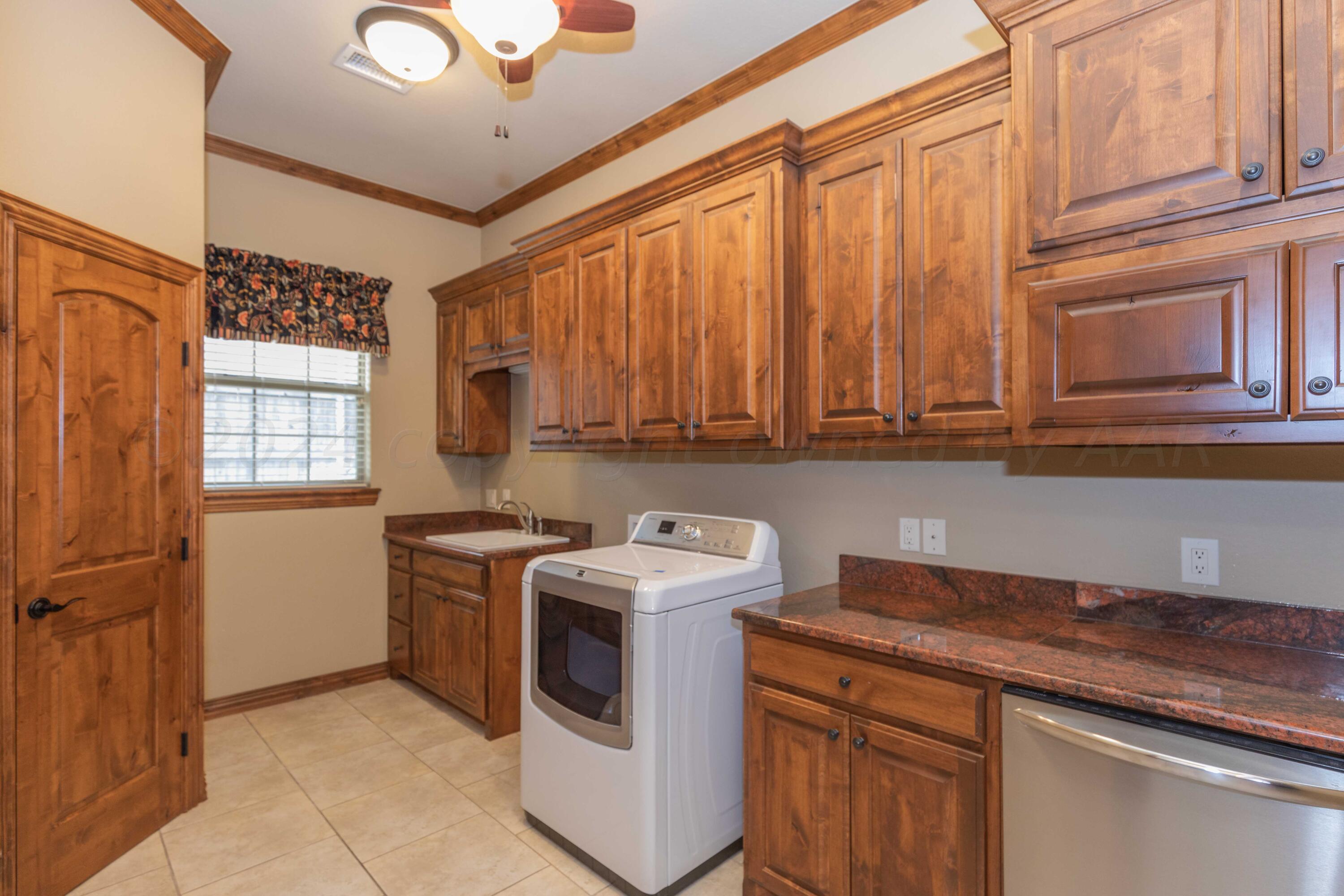 17 Cypress Point Amarillo, TX 79124 - Photo 32 of 72 a view of a kitchen with stove and microwave
