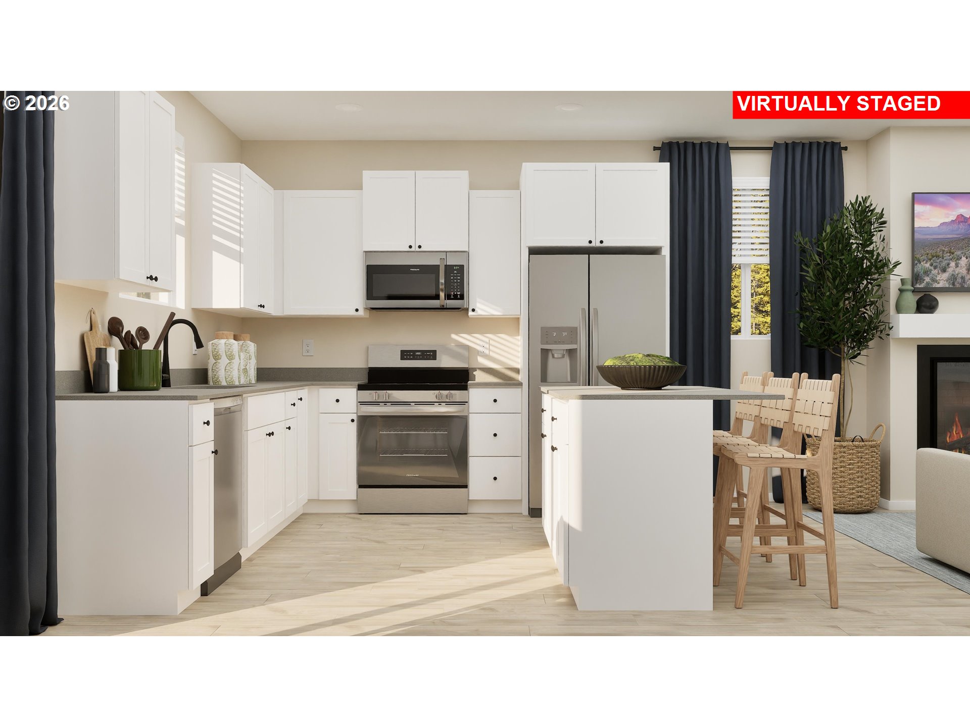 1042 Clemson Street Gervais, OR 97026 - Photo 2 of 13 a kitchen with white cabinets and stainless steel appliances