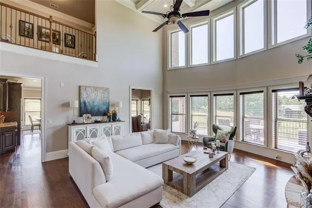 a kitchen with kitchen island granite countertop lots of counter top space and stainless steel appliances