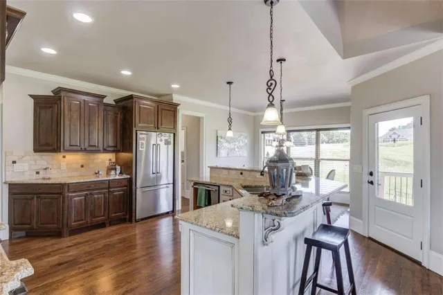 a bedroom with a bed and furniture