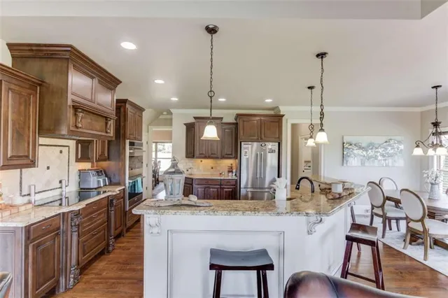 a bedroom with a bed and flat screen tv