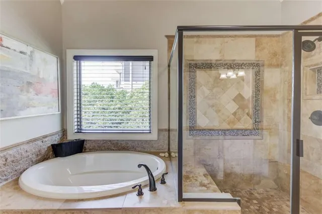 a living room with furniture a chandelier and a chandelier