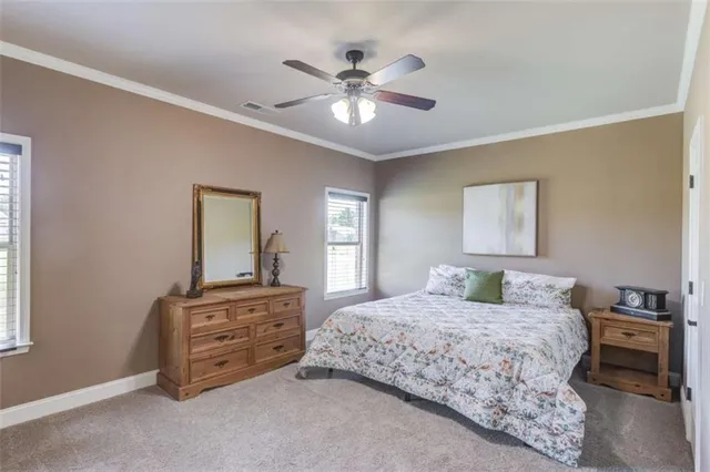a bed room with furniture and a chandelier