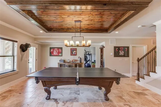 an aerial view of a house with swimming pool