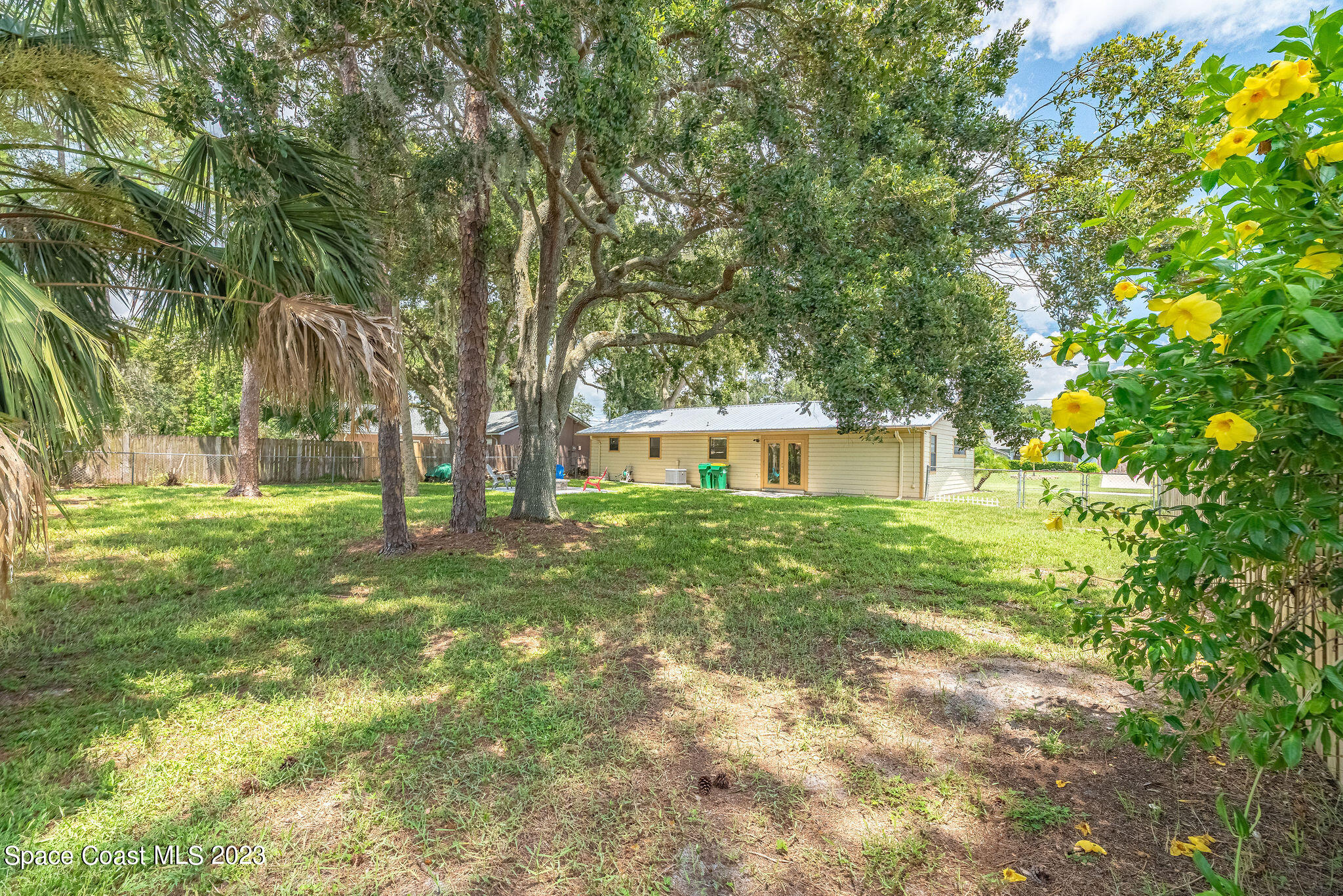 4505 Comfort Street Cocoa, FL 32927 - Photo 12 of 30 a view of a house with yard and a tree