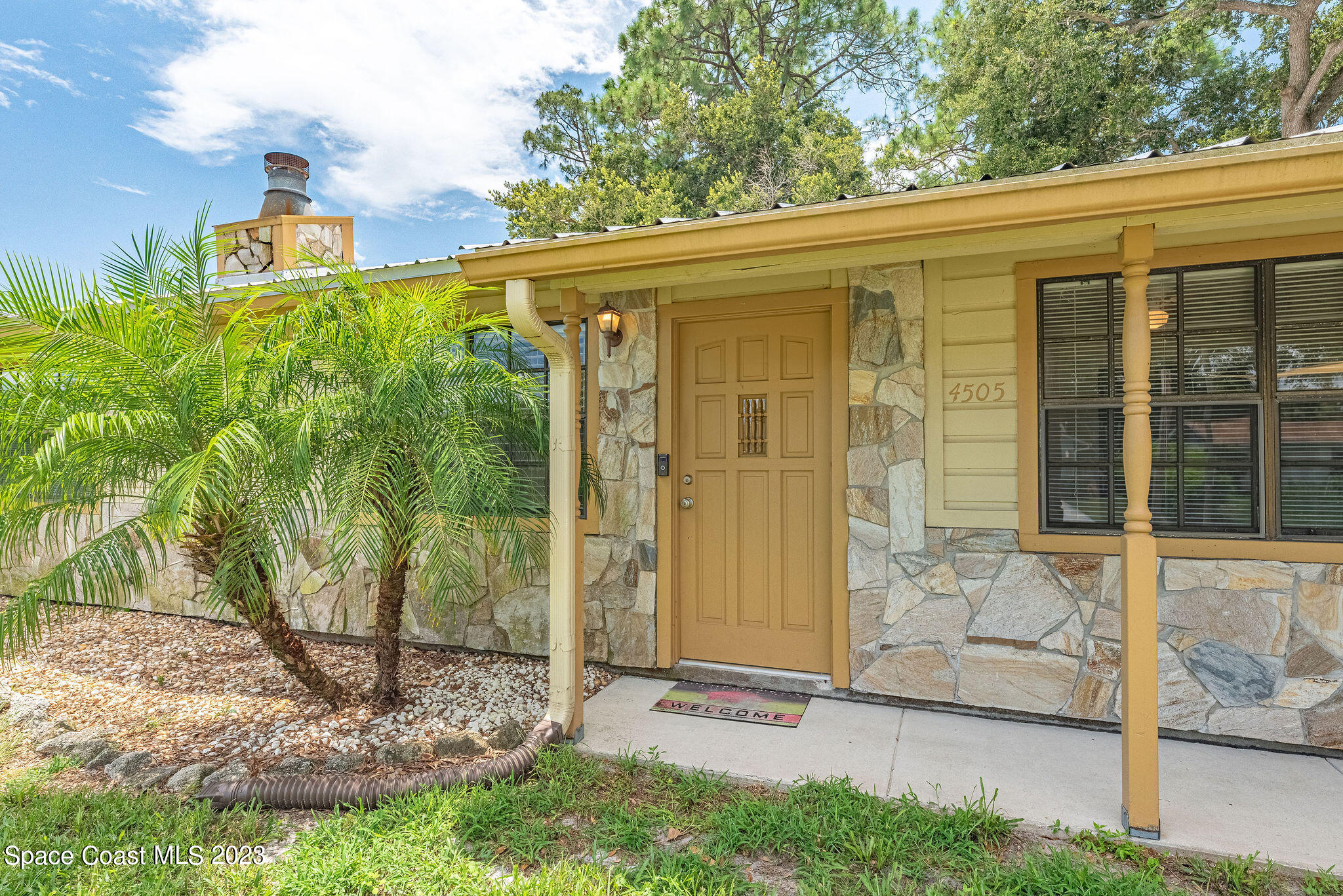 4505 Comfort Street Cocoa, FL 32927 - Photo 2 of 30 a view of a door front of a house