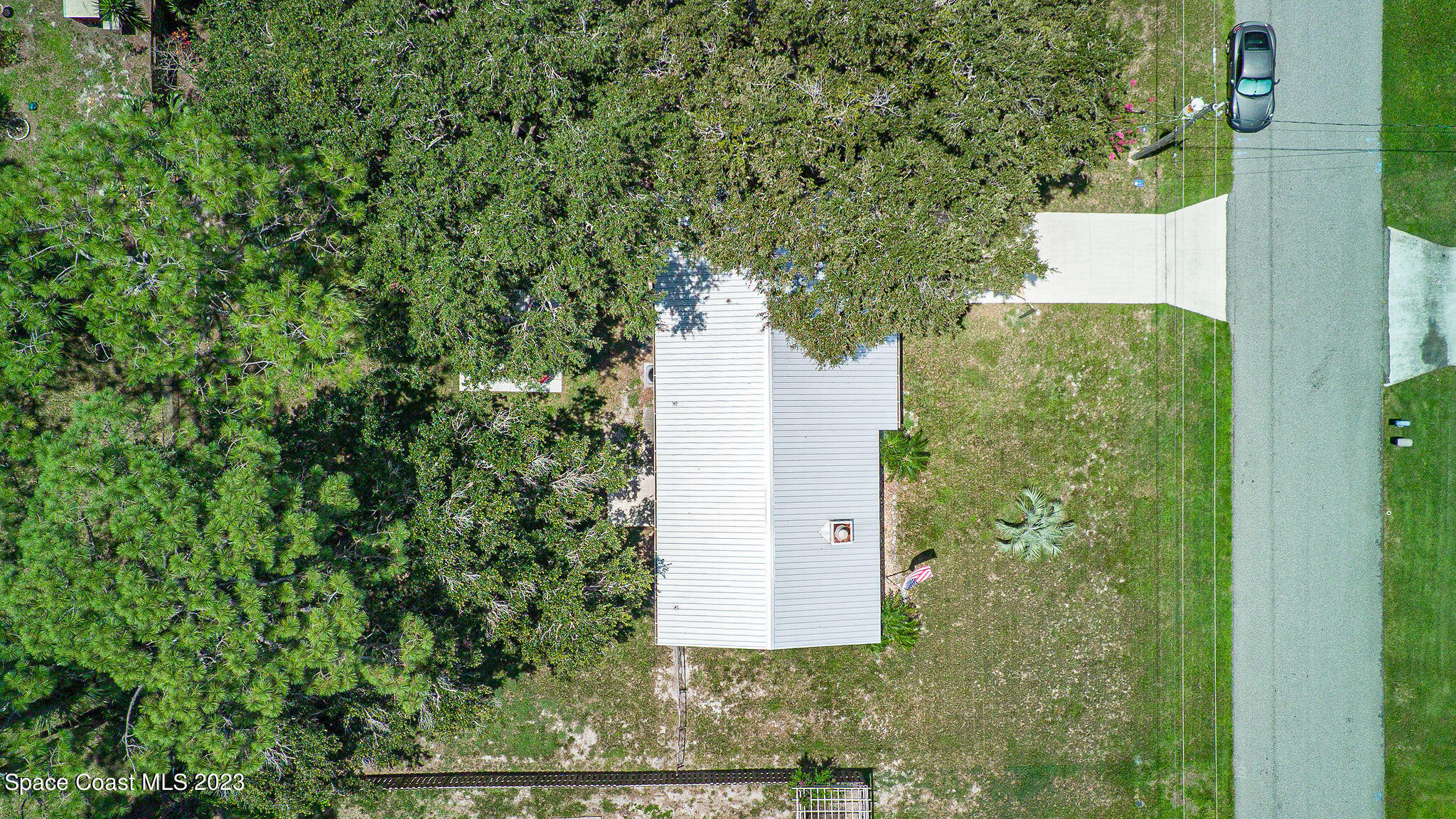 4505 Comfort Street Cocoa, FL 32927 - Photo 25 of 30 a view of a small yard