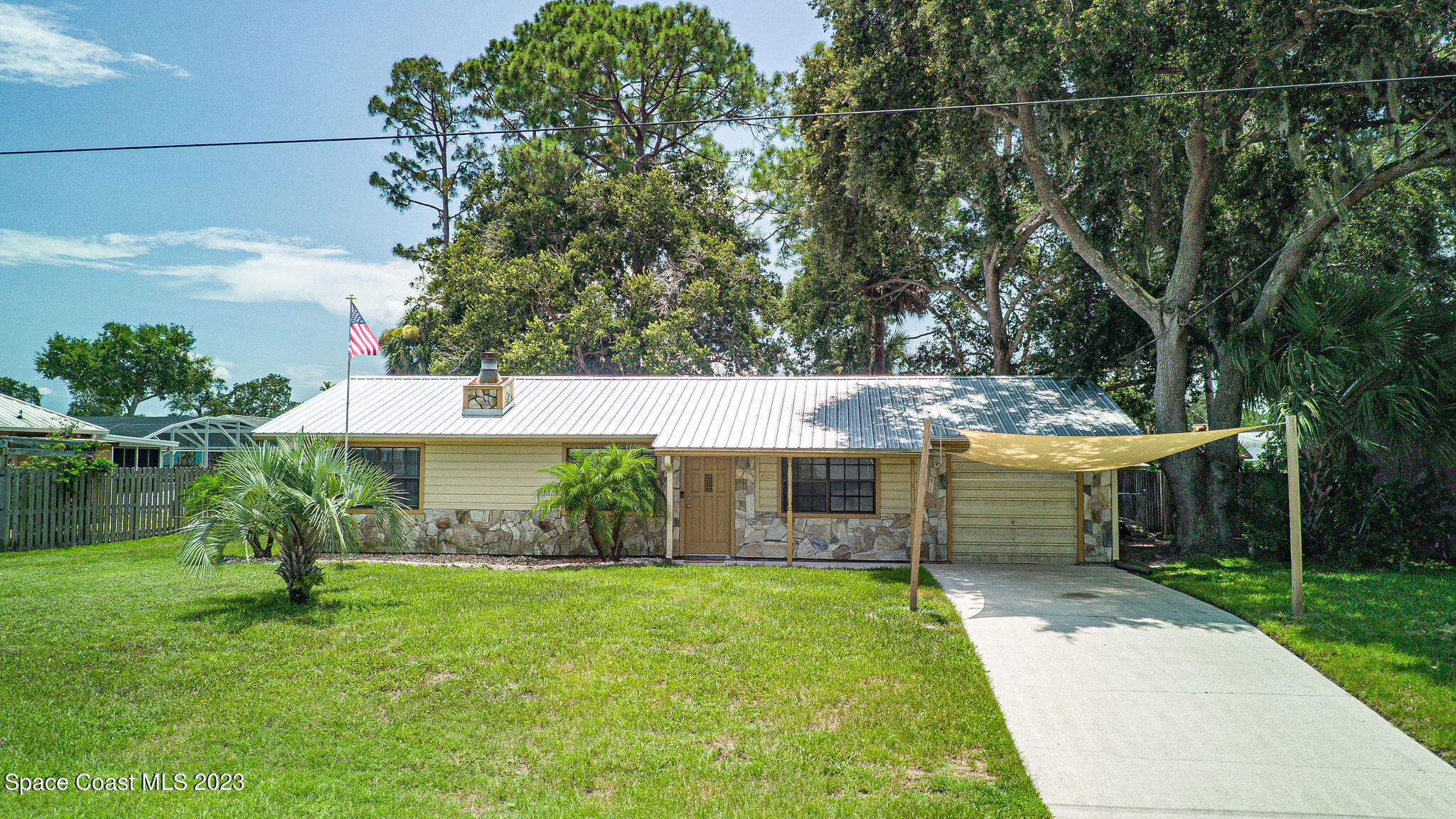 4505 Comfort Street Cocoa, FL 32927 - Photo 28 of 30 a view of a house with a yard