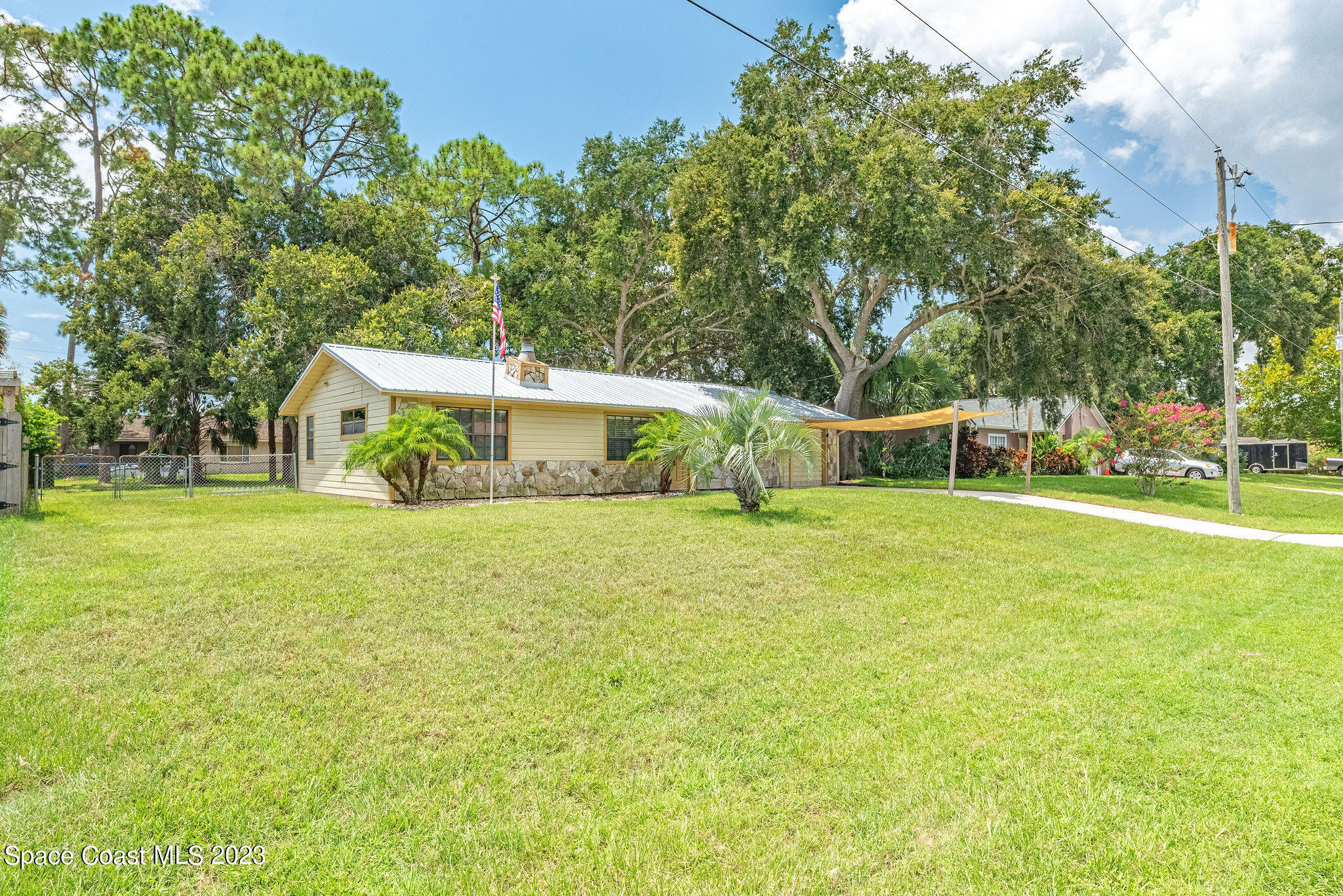 4505 Comfort Street Cocoa, FL 32927 - Photo 30 of 30 a front view of house with yard and green space