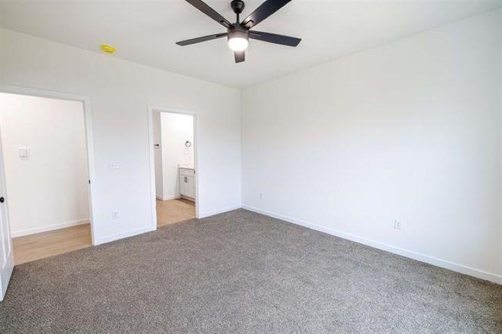 14212 Prairie Commons Lane South Beloit, IL 61080 - Photo 13 of 23 a view of an empty room