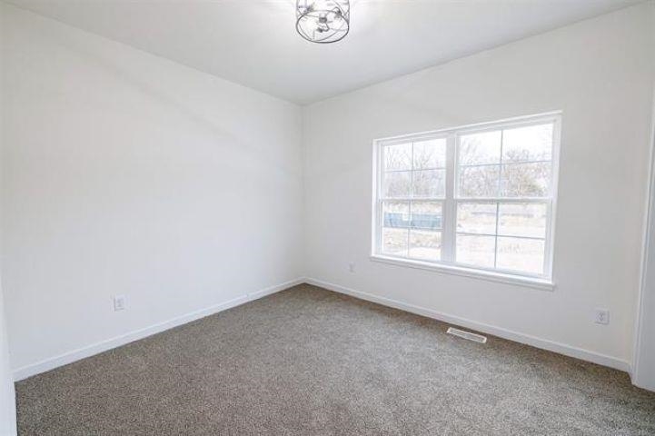 14212 Prairie Commons Lane South Beloit, IL 61080 - Photo 19 of 23 an empty room with a window