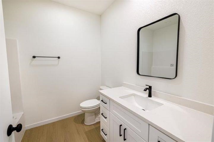 14212 Prairie Commons Lane South Beloit, IL 61080 - Photo 20 of 23 a bathroom with a toilet sink and mirror