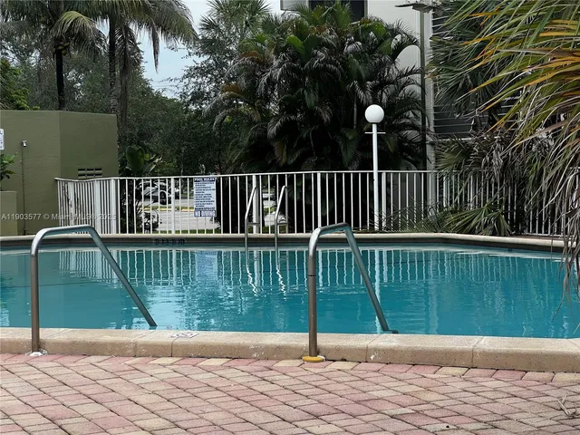 a balcony view with a garden