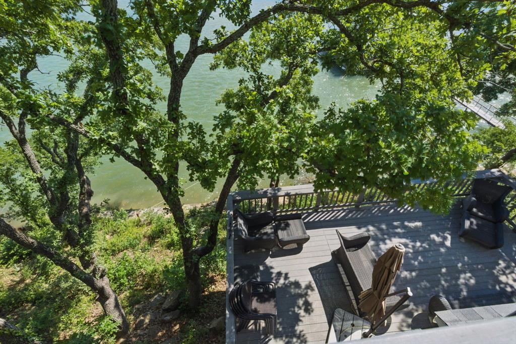 306 Chism Trail Gordon, TX 76453 - Photo 29 of 38 a view of a backyard with sitting area