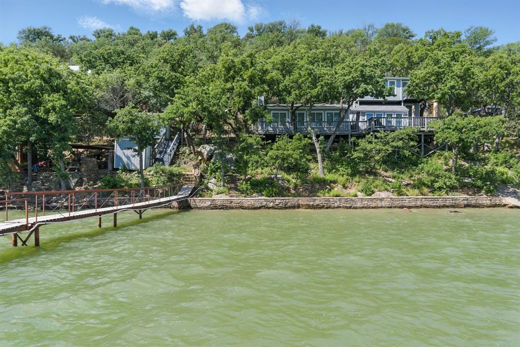 306 Chism Trail Gordon, TX 76453 - Photo 36 of 38 a view of a pool with a yard