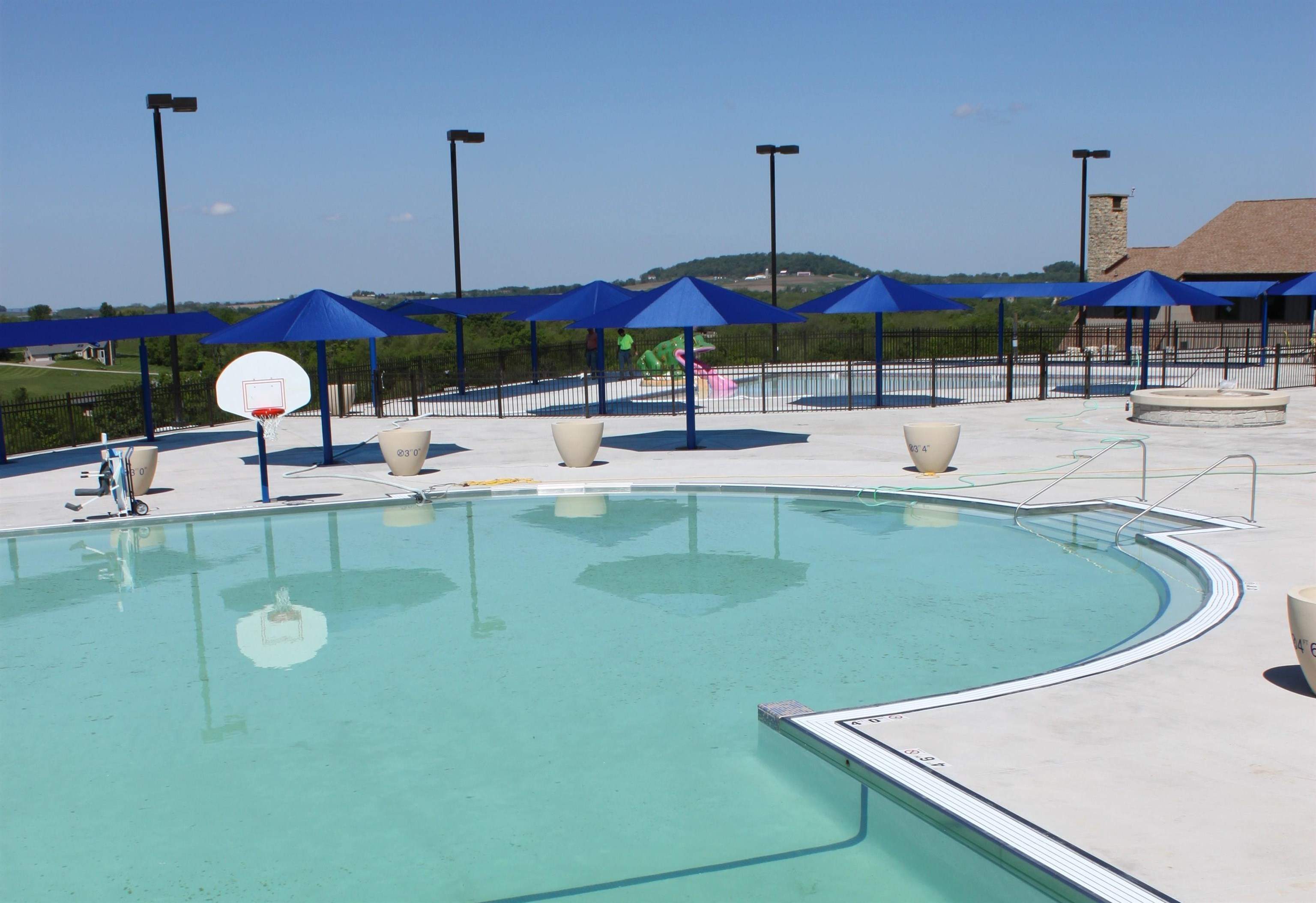 93 Heatherdowns Lane Galena, IL 61036 - Photo 20 of 27 a view of a swimming pool with a chairs