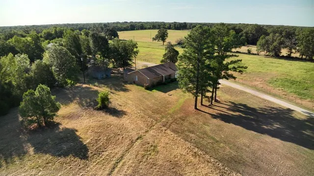 a view of a lake with a yard