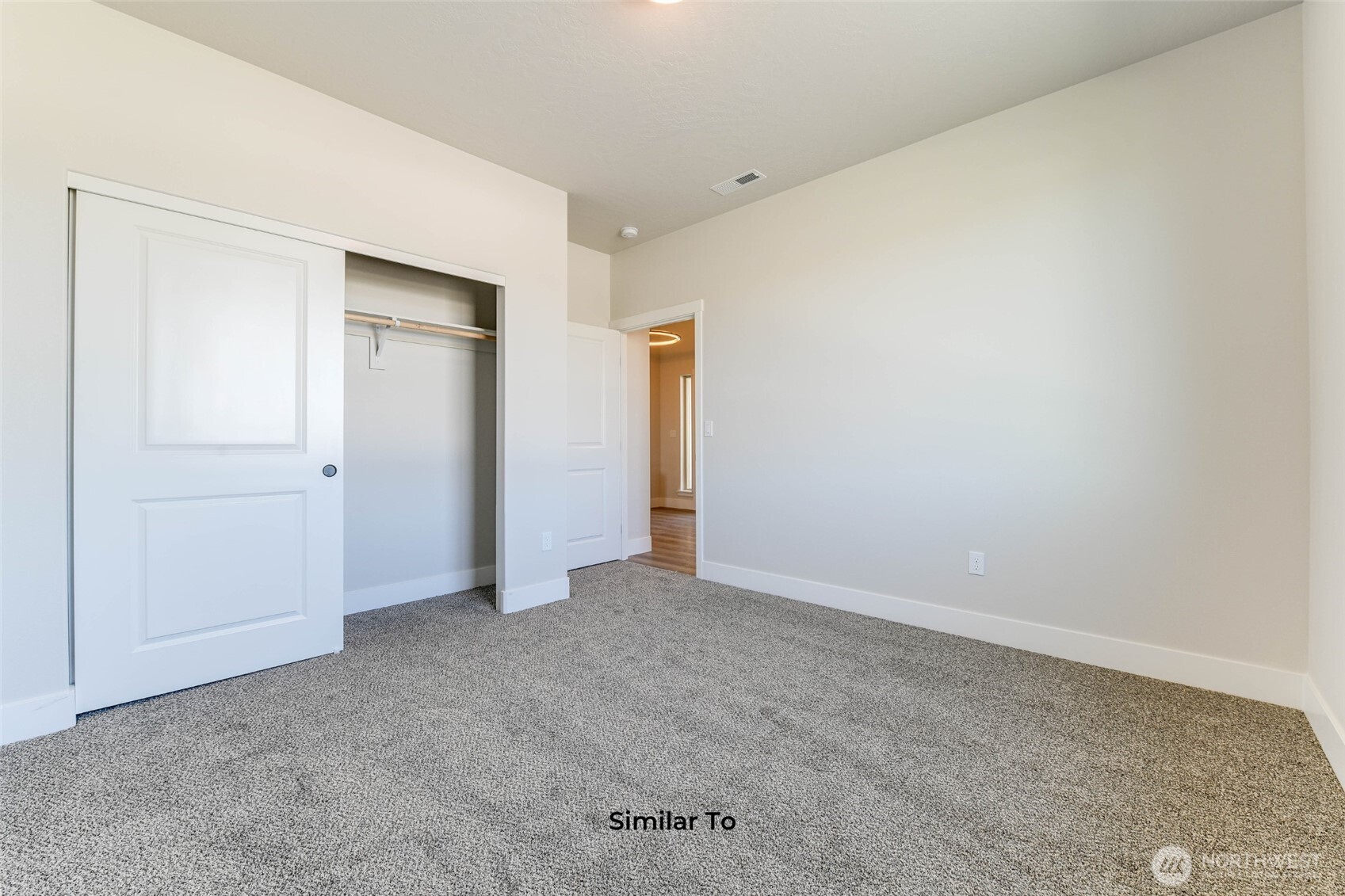 523 North Lessor Loop Moses Lake, WA 98837 - Photo 16 of 25 an empty room with closet area