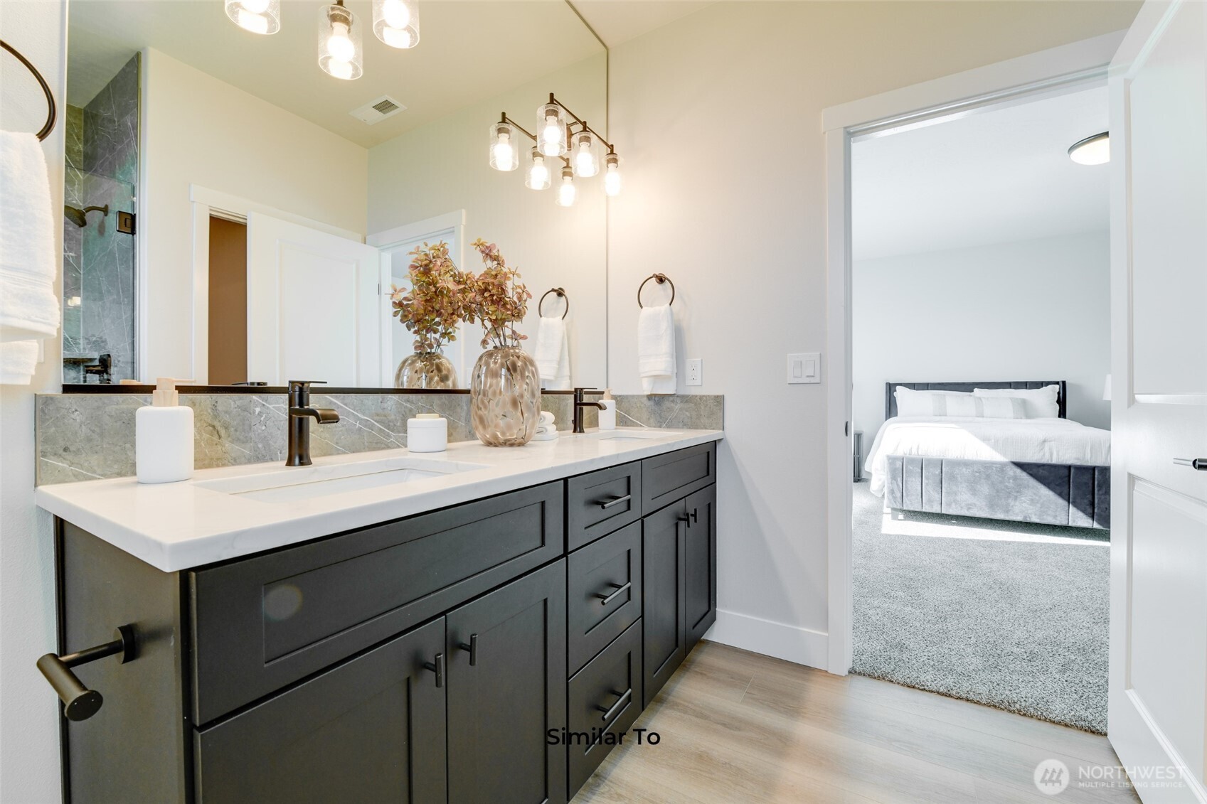 523 North Lessor Loop Moses Lake, WA 98837 - Photo 20 of 25 a bathroom with a sink vanity and mirror