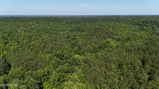 a view of a field with an outdoor space