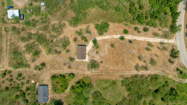 a view of fountain with yard