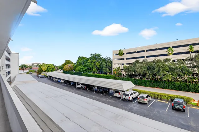 a view of a swimming pool with a lounge chair