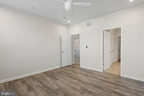 a bathroom with a sink double vanity and a mirror
