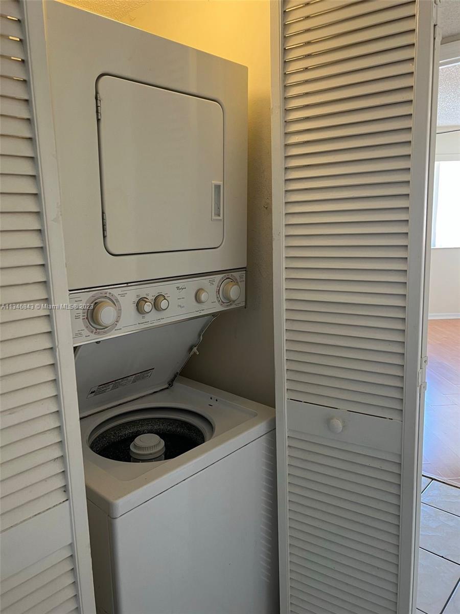 Flagami Miami, FL 33126 - Photo 13 of 14 a utility room with dryer and washer