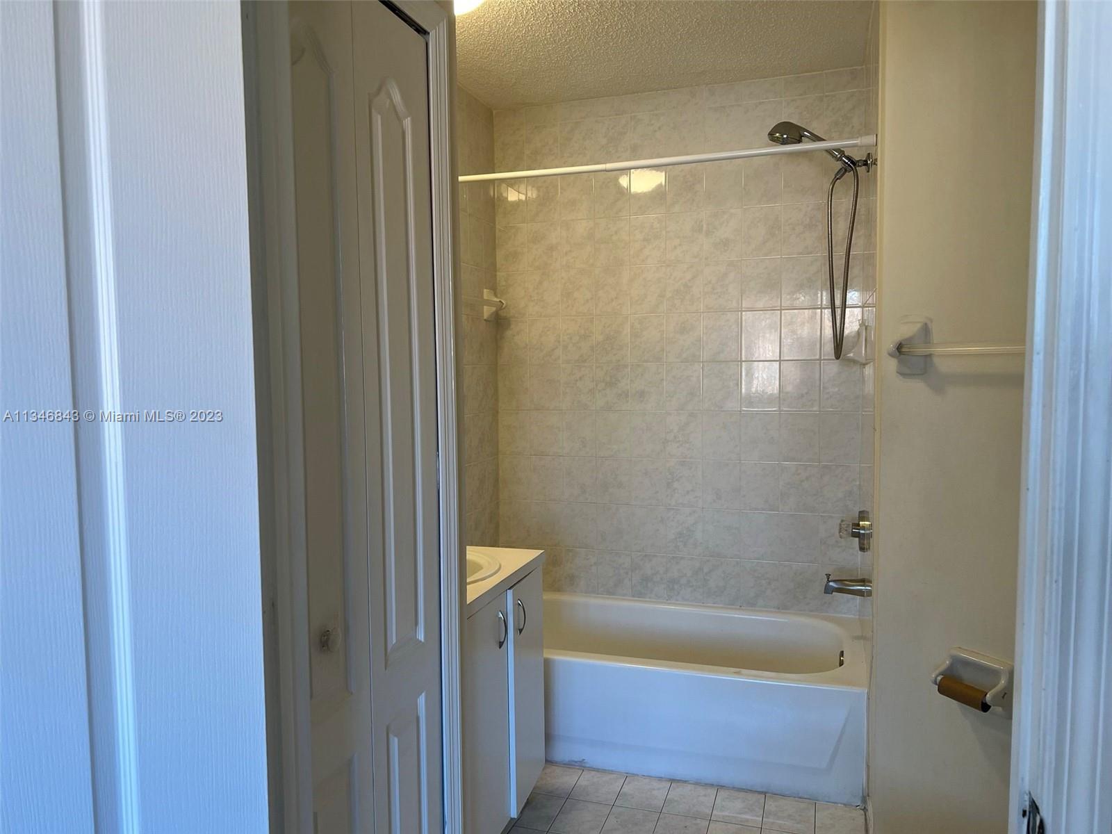 Flagami Miami, FL 33126 - Photo 7 of 14 a bathroom with a shower