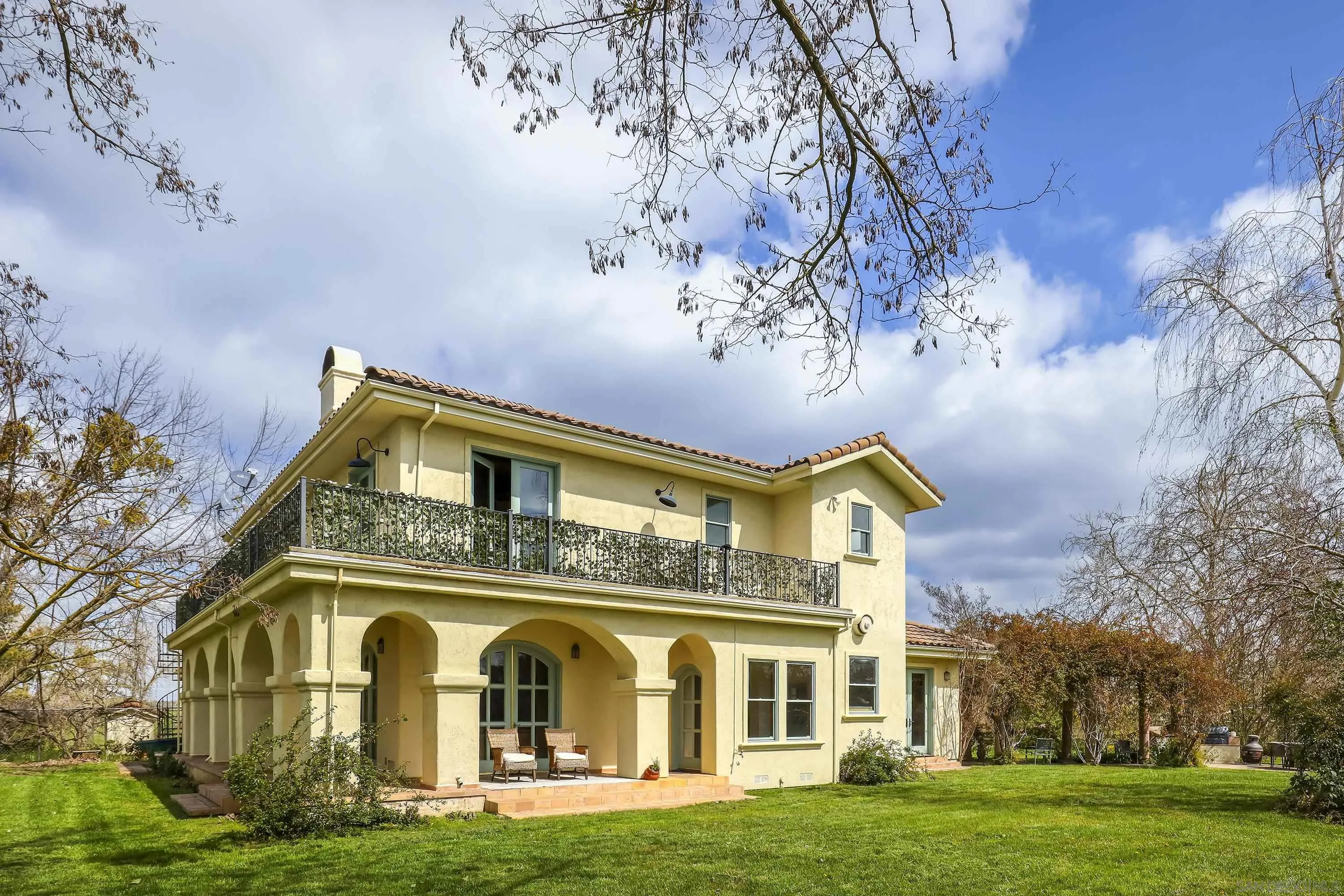 24943 North Mcintire Road Clements, CA 95227 - Photo 18 of 68 front view of a building with a garden