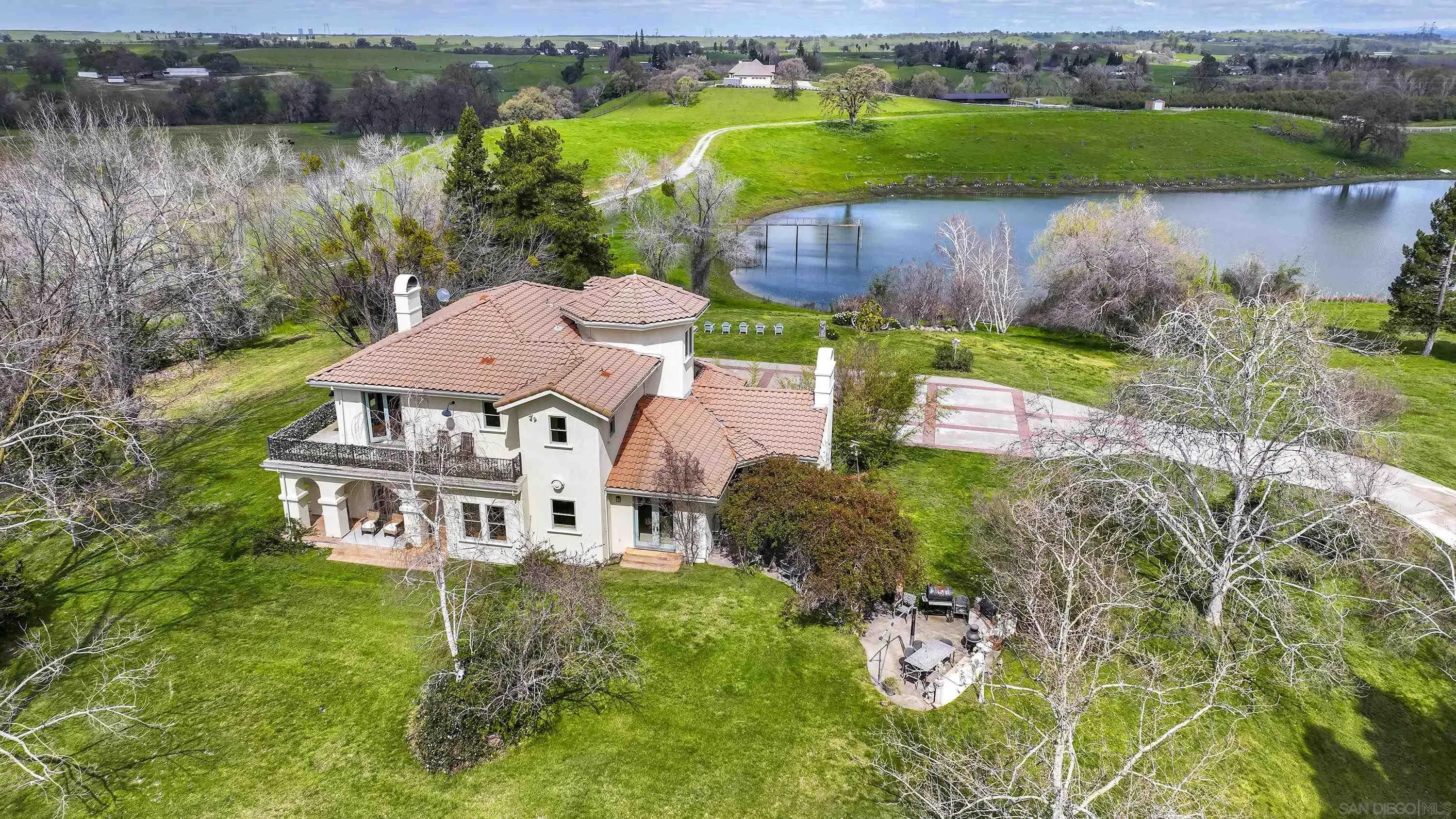 24943 North Mcintire Road Clements, CA 95227 - Photo 29 of 68 an aerial view of a house with garden space and lake view