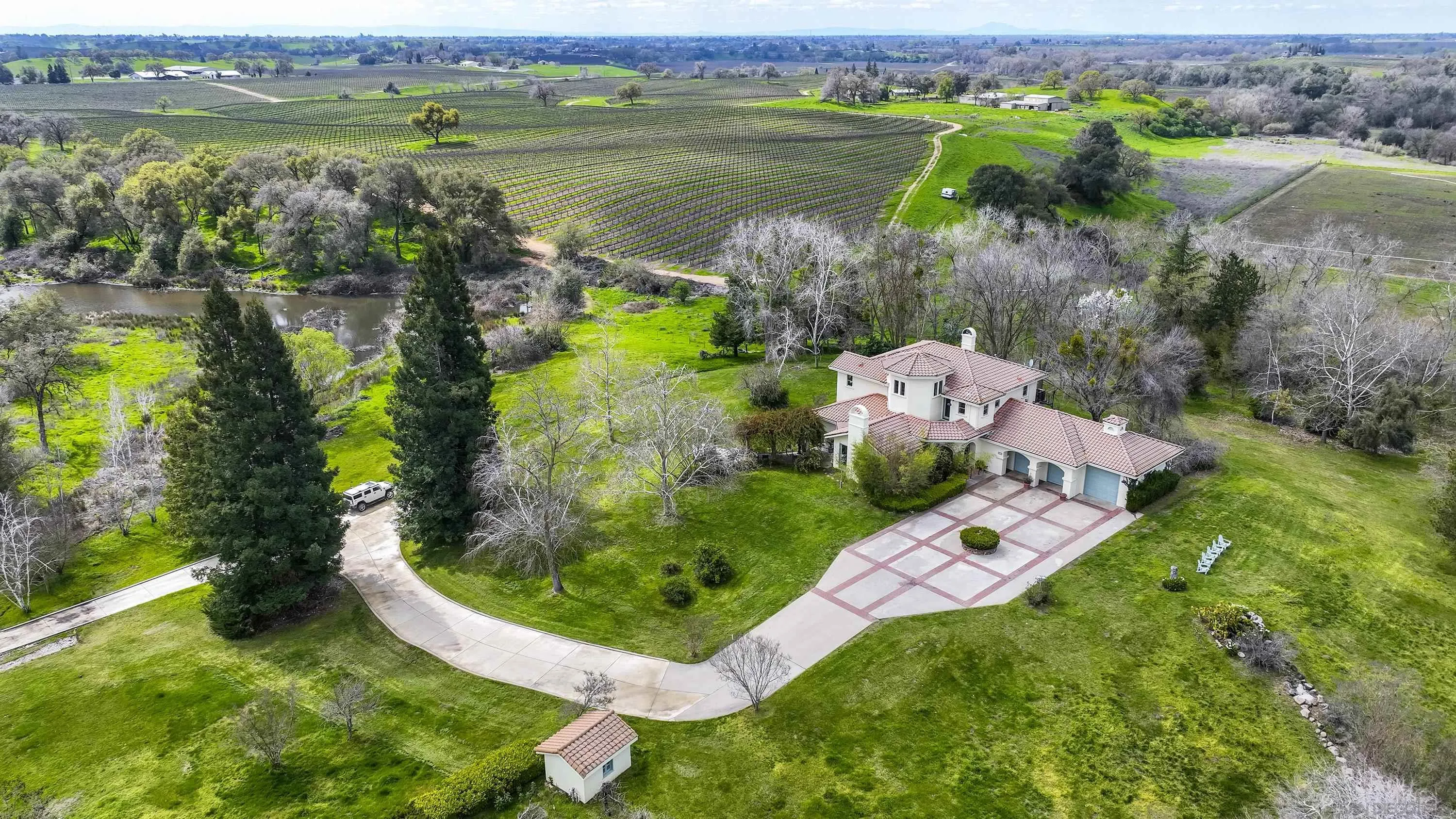 24943 North Mcintire Road Clements, CA 95227 - Photo 31 of 68 a view of a lake with a yard and mountain view