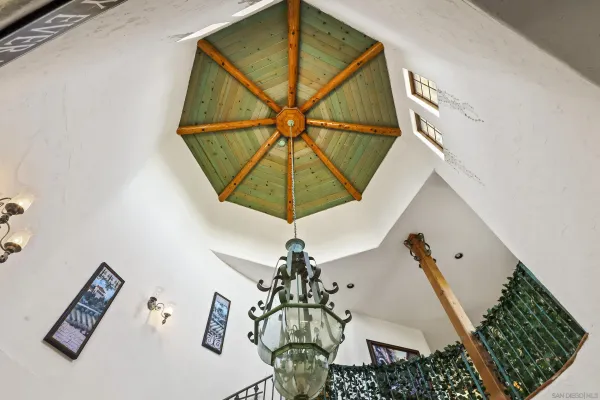 a bedroom with a bed a window and walk in closet