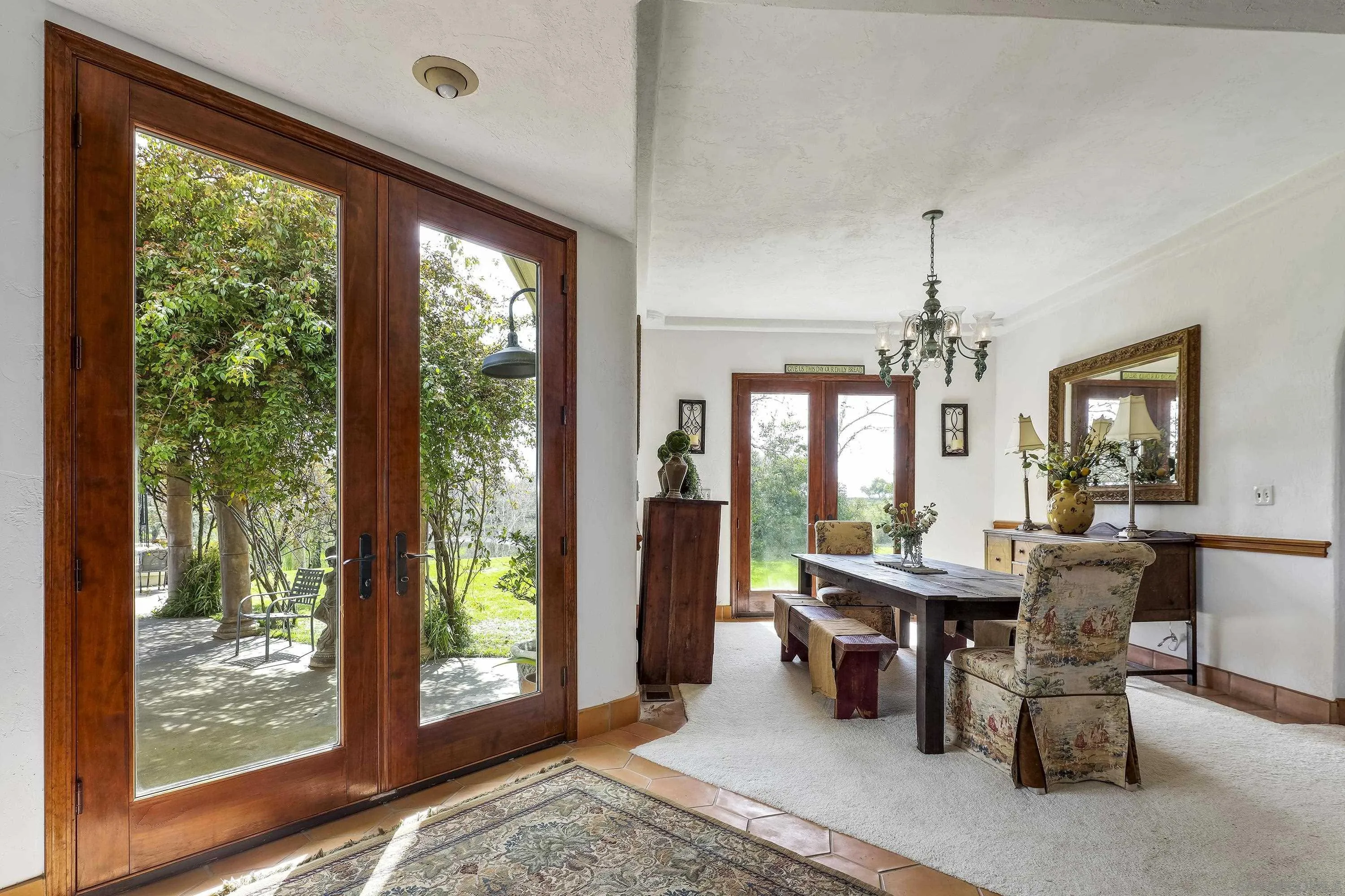 24943 North Mcintire Road Clements, CA 95227 - Photo 42 of 68 a view of a dining room with furniture window and outside view