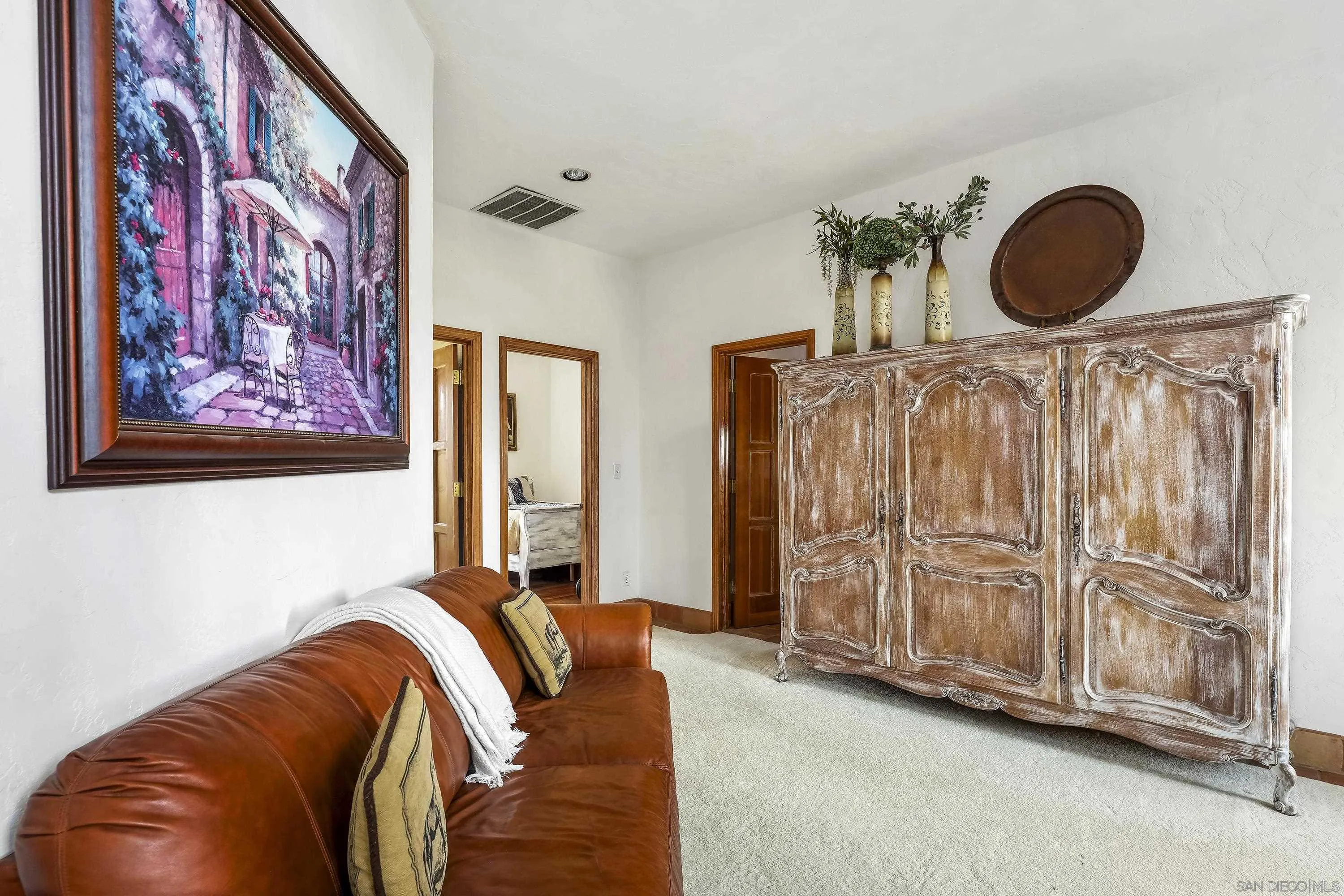 24943 North Mcintire Road Clements, CA 95227 - Photo 60 of 68 a bedroom with a bed and a painting on the wall