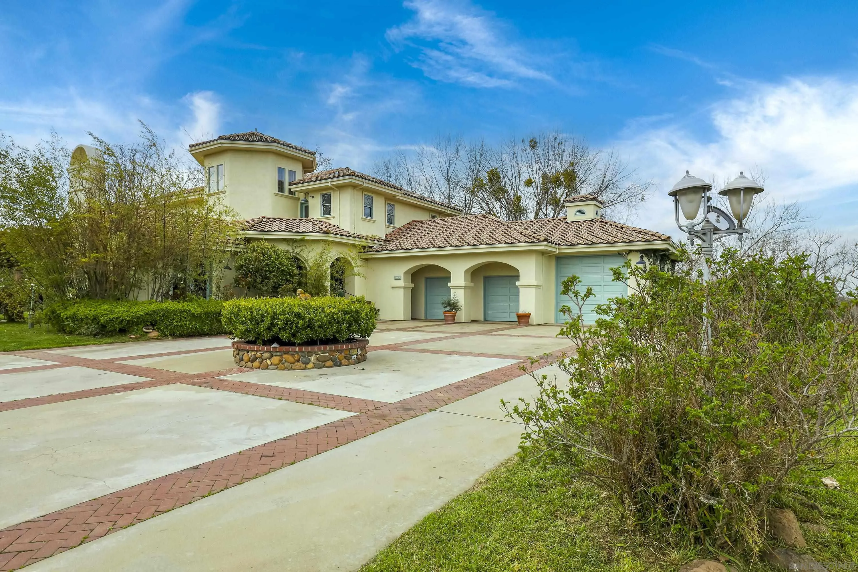 24943 North Mcintire Road Clements, CA 95227 - Photo 6 of 68 a front view of a house with a yard