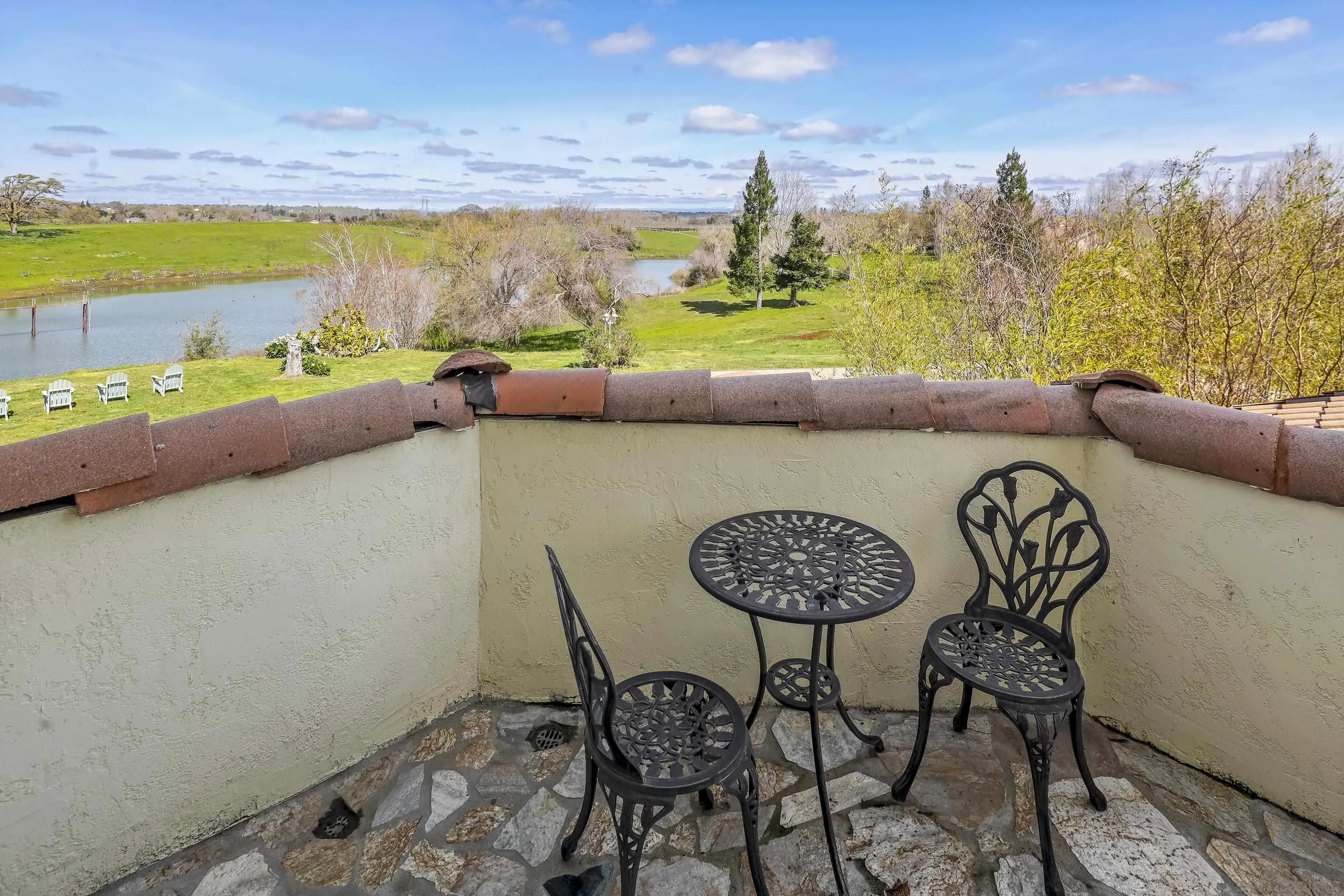 24943 North Mcintire Road Clements, CA 95227 - Photo 62 of 68 a view of a chairs and table in patio