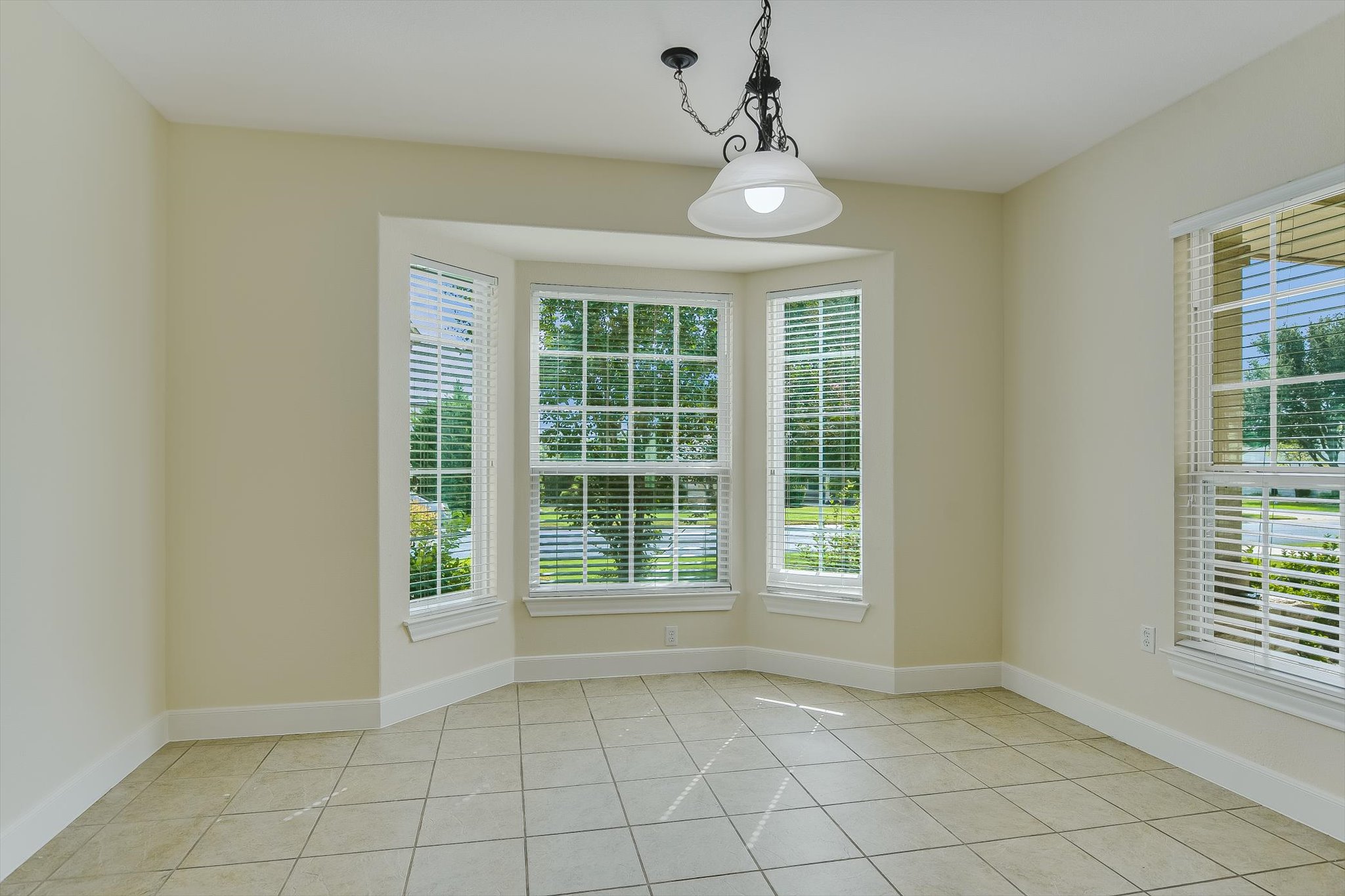 603 Rio Grande Loop Georgetown, TX 78633 - Photo 9 of 27 Unfurnished dining area featuring plenty of natural light and light tile patterned floors