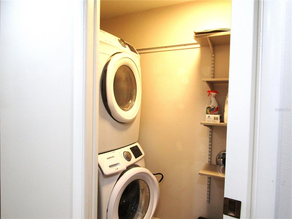 5056 Marsh Field Road, Unit 7 Sarasota, FL 34235 - Photo 14 of 31 a utility room with dryer and washer