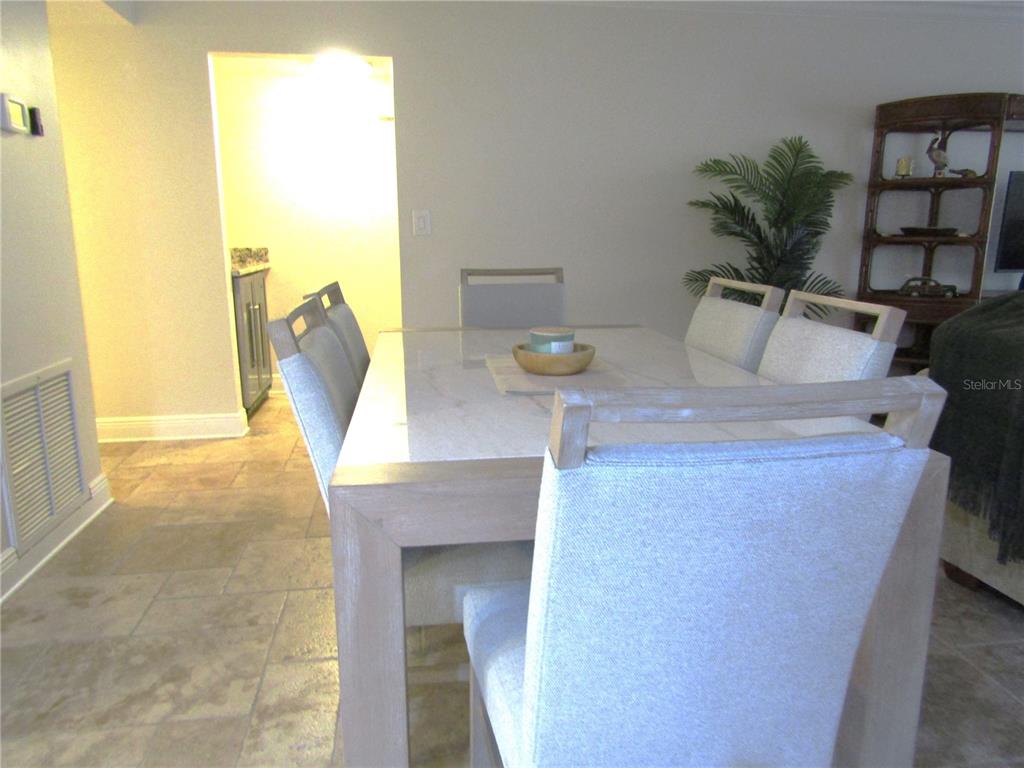 5056 Marsh Field Road, Unit 7 Sarasota, FL 34235 - Photo 16 of 31 a view of kitchen and living room