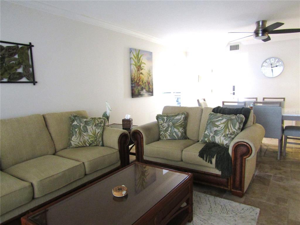 5056 Marsh Field Road, Unit 7 Sarasota, FL 34235 - Photo 18 of 31 a living room with furniture