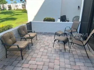 a view of yard with outdoor seating