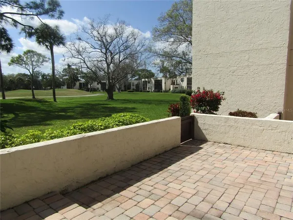 a view of swimming pool with a yard