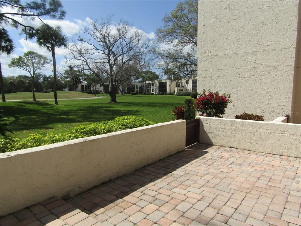 5056 Marsh Field Road, Unit 7 Sarasota, FL 34235 - Photo 31 of 31 a view of swimming pool with a yard