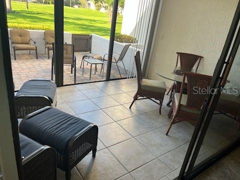 5056 Marsh Field Road, Unit 7 Sarasota, FL 34235 - Photo 7 of 31 a view of living room with furniture and large windows