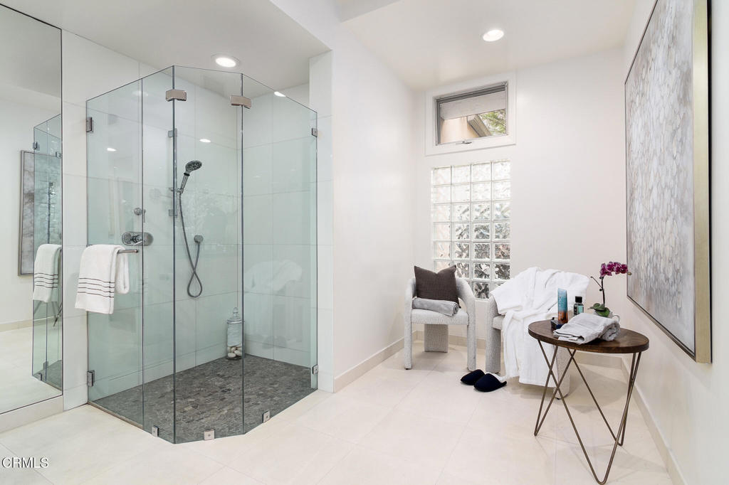 101 Rios Court Solana Beach, CA 92075 - Photo 32 of 67 a bathroom with a shower and a sink