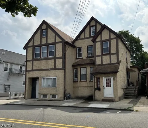 a front view of a house with a garage
