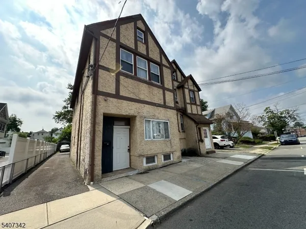 a view of a street in front of house