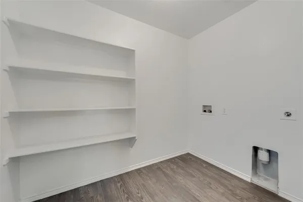 a view of an empty room with empty racks